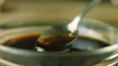 I cook coca syrup and brown sugar Stock Footage 165353319
