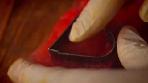 I cut the watermelon pieces in the shape of a heart and stars. 4k video Stock Footage 157437161