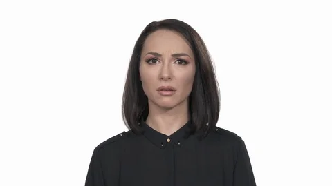 I don't know gesture. Portrait of confused woman standing with raised up hands 스톡 동영상 125182360