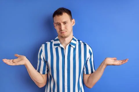 I don't know. Man misunderstanding, shrugging Stock Photos