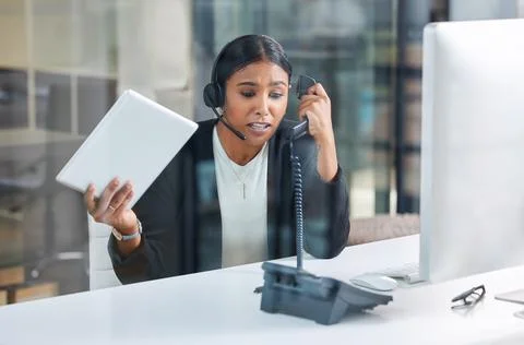 I dont know what to do anymore. an attractive young businesswoman sitting alone Stock Photos