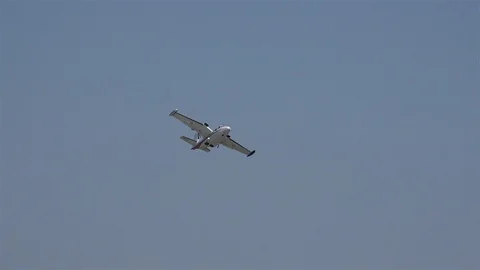 I-FENI, Piaggio P.166 propeller airplane flying Stock Footage 114071908