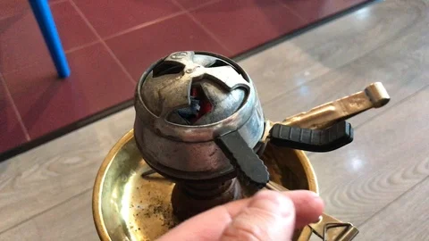 I fix the coals on the hookah 動画素材 97023830
