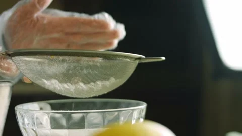I give powdered sugar through a stainless steel sieve. I prepare the cream for Stock Footage 165356025