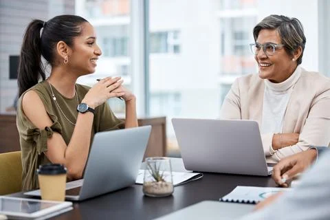 I like the idea were bouncing off each other. two businesswomen having a meeting Stock Photos