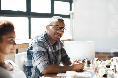 I keep my notes in digital format. Portrait of a businessman using a digital Stock Photos