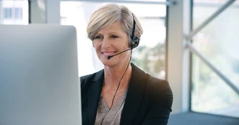 I know exactly how to solve that issue. a mature businesswoman wearing Stock Photos