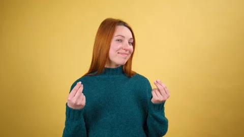 I know how to earn. Smart young woman smiling slyly, having idea about big Stock Footage 148287559