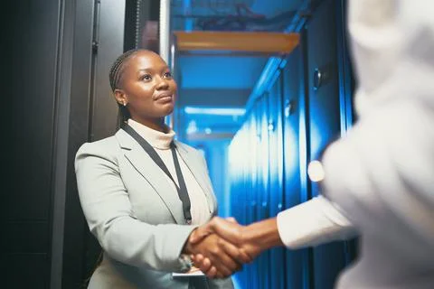 I look forward to having your expertise around. a young IT specialist standing 스톡 사진