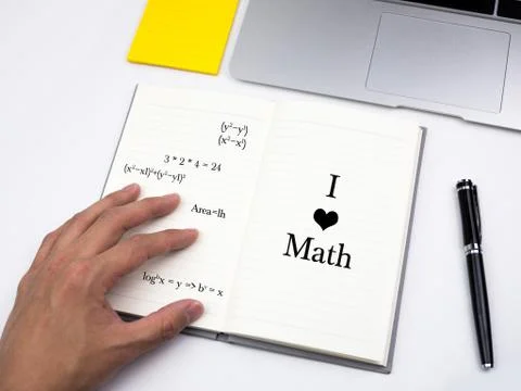 I love math on note book on desk Stock Photos