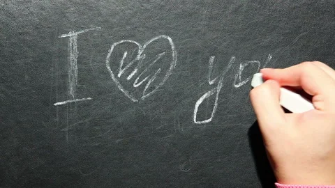 I love you - hand write text with chalk on blackboard Stock Footage 94039909