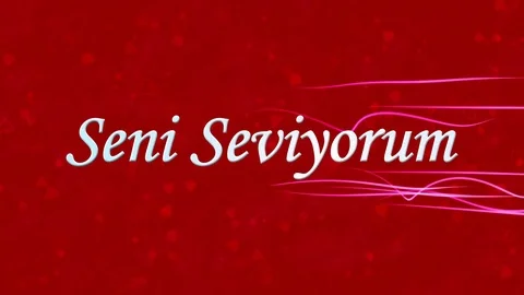 "I Love You" text in Turkish "Seni Seviyorum" formed from dust and turns to dust Stock Footage 71412995