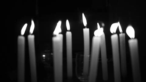 I mac in dark room  candles back and white Stockbeeldmateriaal 135376200