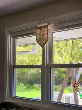 'I Need Thee Every Hour' Banner by Window Stock Photos