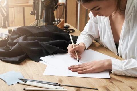 I need to write it down until it slipped my mind. Focused creative clothes Stock Photos