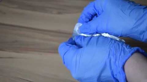 I open pills with gloves on Video stock 234341865