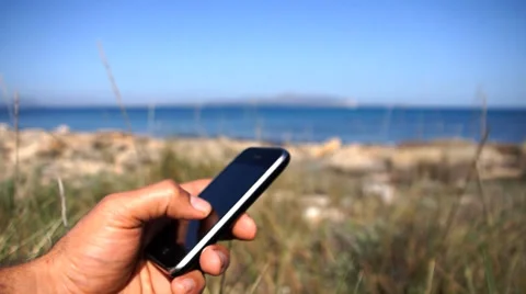 I Phone on the beach Stock Footage 35187731
