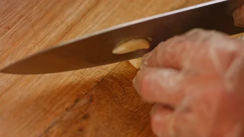 I prepare and grind the garlic. Homemade chili sauce. 4k video Stock Footage 164986996