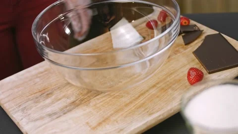 I prepare the transparent bowl to make the cake. 4k video Stock Footage 164545668