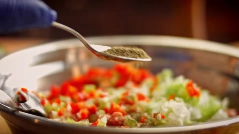I put black pepper on minced meat with vegetables. 4k video Stock Footage 157289729