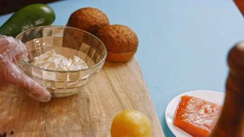 I put the cheese bowl on the table. 4k video Stock Footage 164402644
