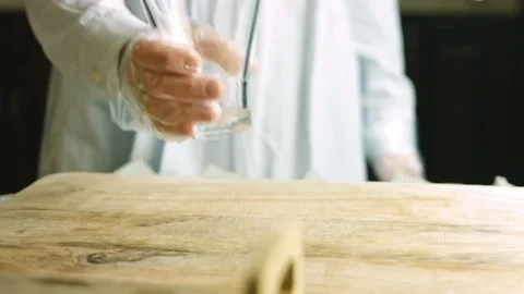 I put a clear glass on the table Stock Footage 165349543