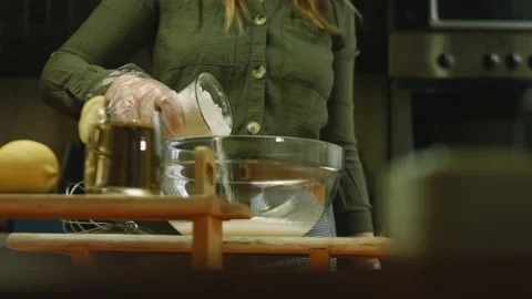 I put a cup of flour on the dough ingredients Stock Footage 165067109