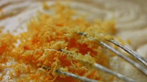 I put the grated lemon peel on the ingredients. I make Pound Cake Stock Footage 159760981