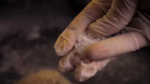 I put sea salt over the fried meat. 4k video Stock Footage 157765912