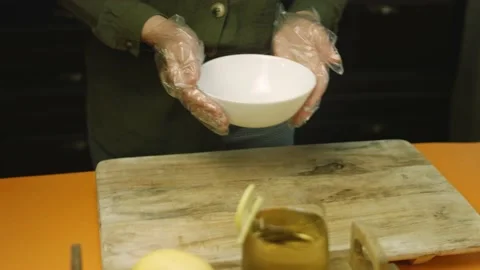 I put a white bowl on the table Stock Footage 165065799