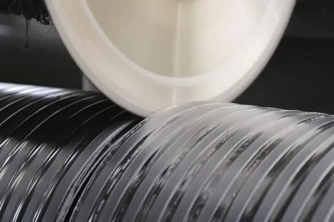 I sawed black polypropylene pipe with a saw blade. Stock Photos