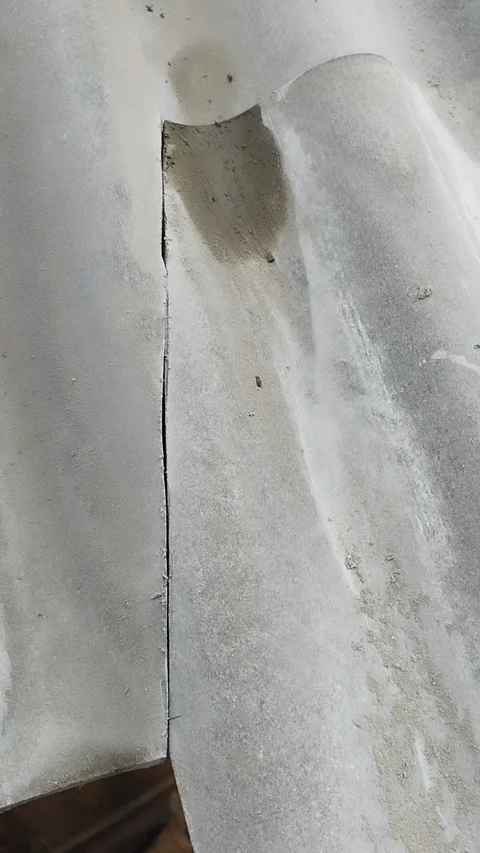 I sawed the corners of two of the four sheets of slate for a tight fit Stock Footage 311393755