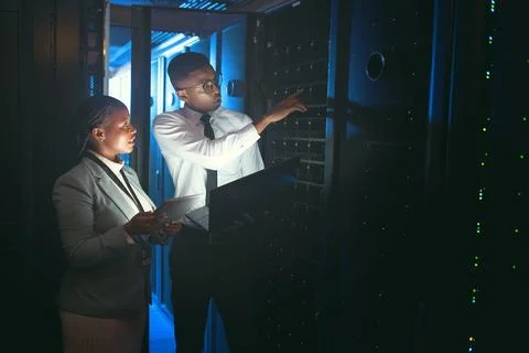 I seem to be having issues with this harddrive. two young IT specialists Stock Photos