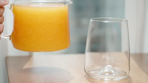 I squeeze out white toothpaste on a black background. Dolly slider extreme close Stock Footage 249700023