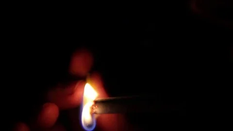 I start to smoke at night. Close-up. Darkness-light-darkness Stock Footage 71117677