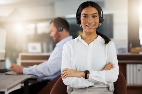 I stayed late to secure my success. Portrait of a young call centre agent Stock Photos