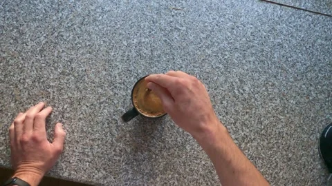 I stir my coffee with a teaspoon Stock Footage 332428004