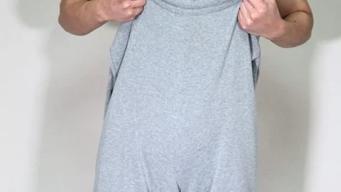I succeeded in my diet and now my pants are too big. Video stock 336680765