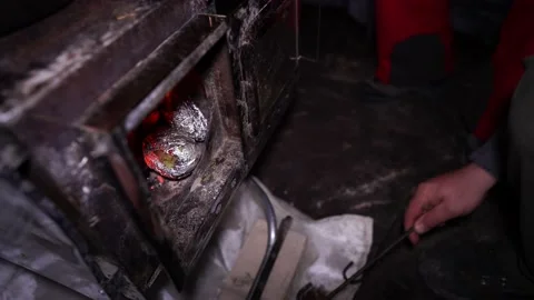 I take out baked potatoes in foil from the oven Stock Footage 237017009