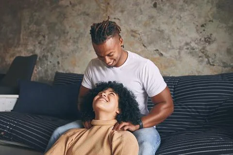 I think we should make massages a daily thing. a young man massaging his Foto stock