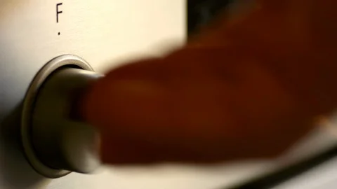 I turn on a silver oven to cook food, the display turns on with the information  Stock Footage 129378732