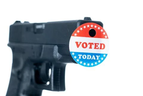 I voted today campaign button with hole on handgun for voter suppression C... Stock Photos