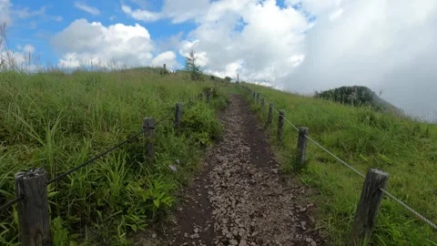 I walk the mountain path Stock Footage 315596855