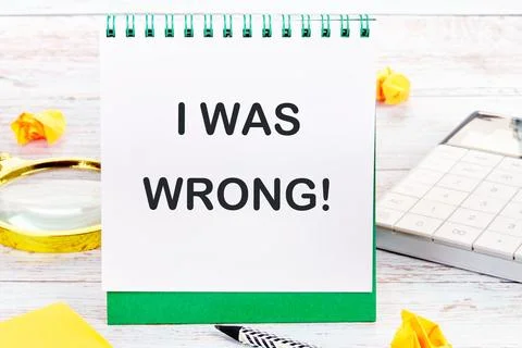 I WAS WRONG on a blank sheet of a desktop notebook 스톡 사진