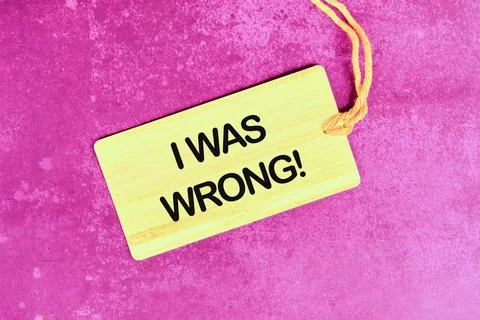 I WAS WRONG on a card with a rope on an abstract background Stock Photos