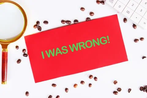 I WAS WRONG on a red crust, on a white background. View from above Stock Photos