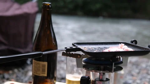 I will grill meat alone outside MOV Stock-Footage 168216652