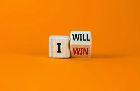 I will win symbol. Turned a wooden cube and changed words i will to i win. Be 스톡 사진