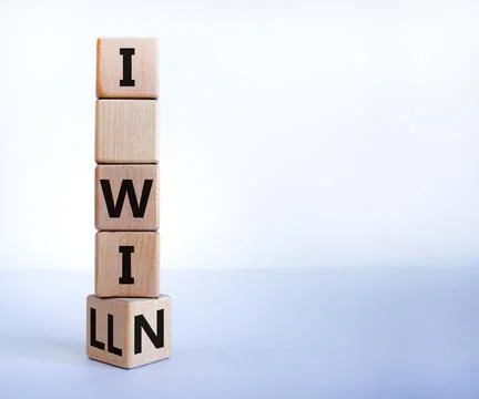 I will win symbol. Turned a wooden cube and changed words i will to i win. Be Stock Photos
