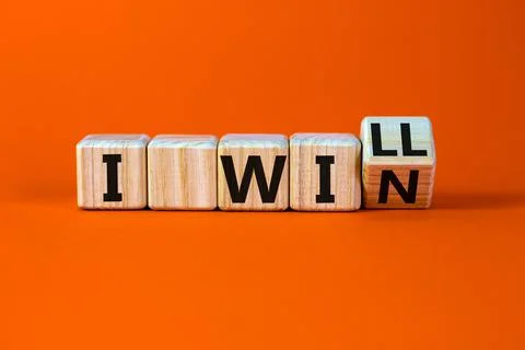 I will win symbol. Turned a wooden cube and changed words i will to i win. Be 스톡 사진